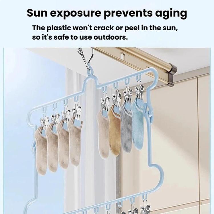 Blue foldable socks drying hanger with clips holding socks in outdoor-style view