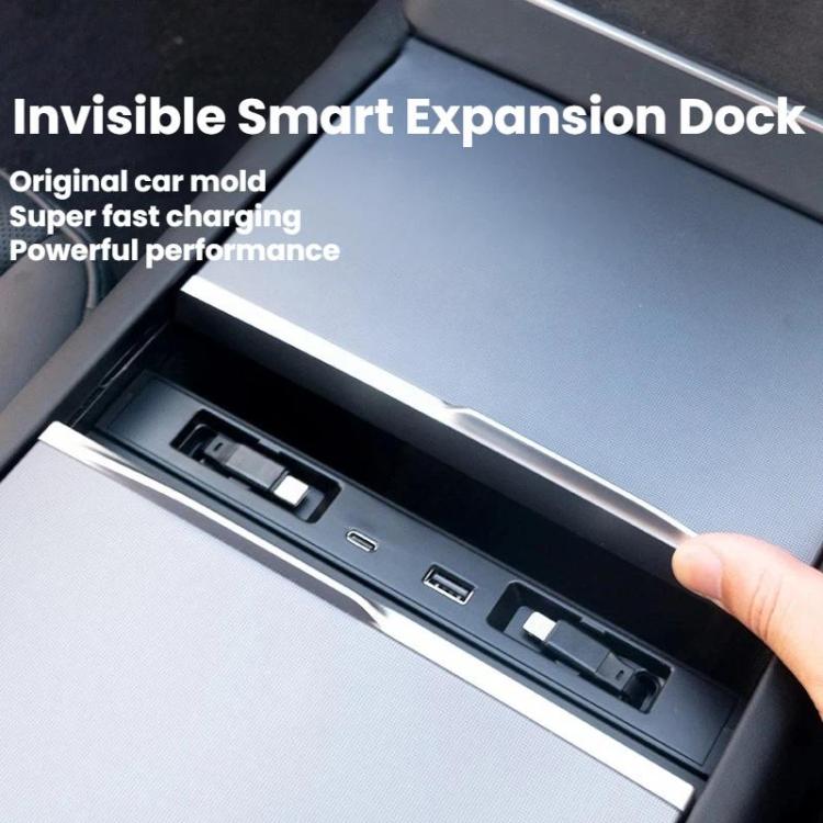 Black invisible smart charging dock with recessed port openings in console