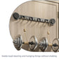 Black suction cup multi-hook rack on a door with several hanging hooks