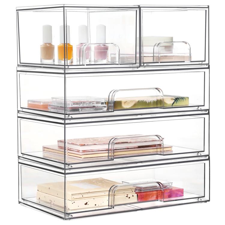 Three-tier transparent cosmetic organizer with open bins for skincare bottles, sticks, and folded items