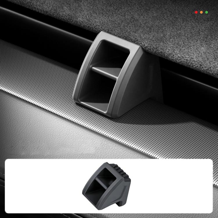 Car air vent clip mount bracket clipped on a vent grille, dark gray
