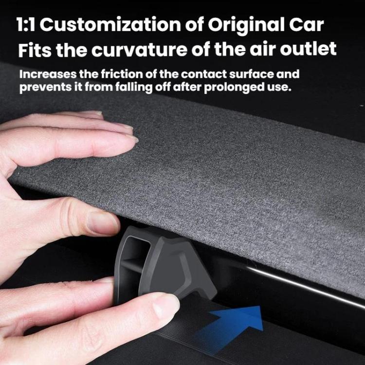 Car air vent clip mount bracket being installed on the dashboard air outlet