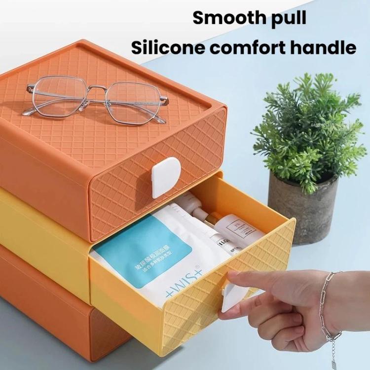 Orange plastic drawer organizer with smooth pull handle and open inner compartment