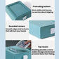 Teal plastic drawer organizer with rounded corners and textured non-slip bottom