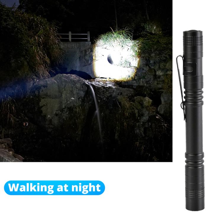 Black mini flashlight with intense white light beam, compact handheld design