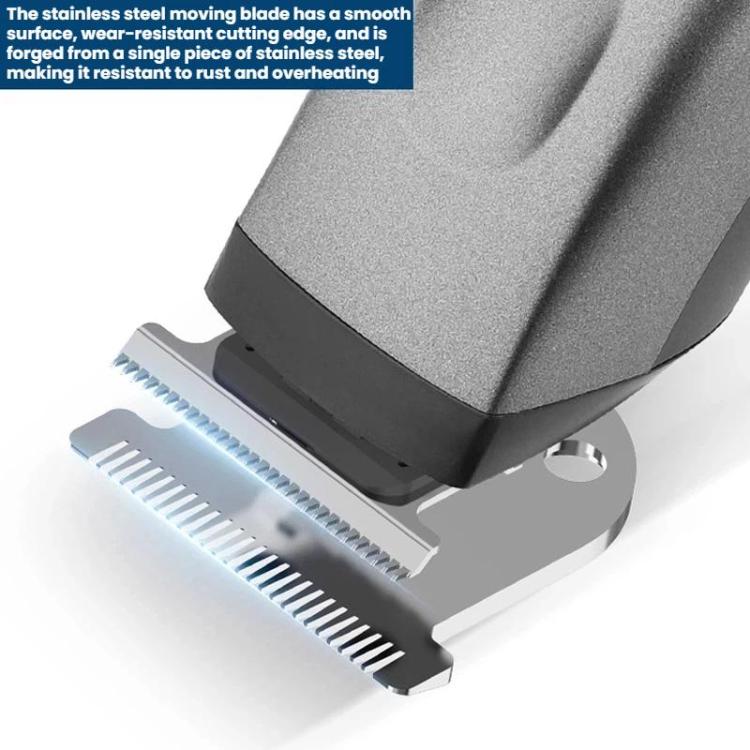Close-up of electric clipper blade with protective guard and metal cutting teeth