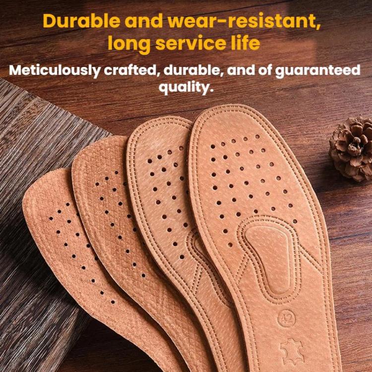 Set of tan leather insoles with stitched arch design and dotted ventilation holes