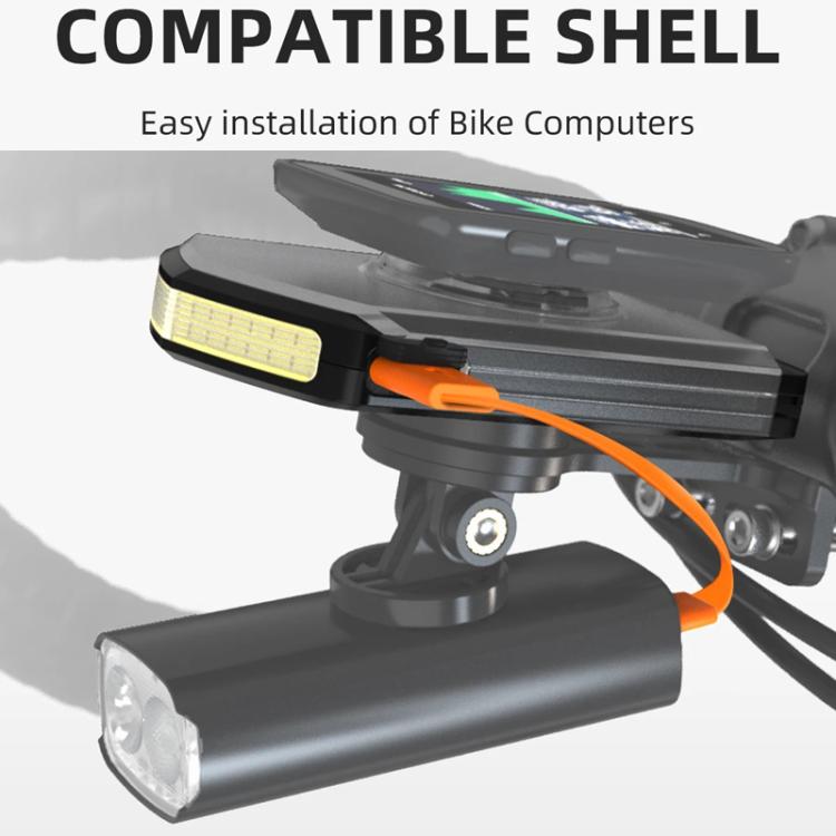 Black bike warning light with amber side LEDs and orange charging cable