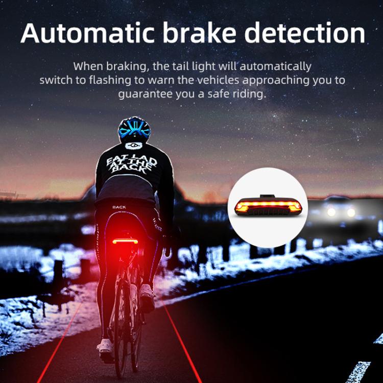 Bicycle tail light flashing red during braking, with laser warning beam