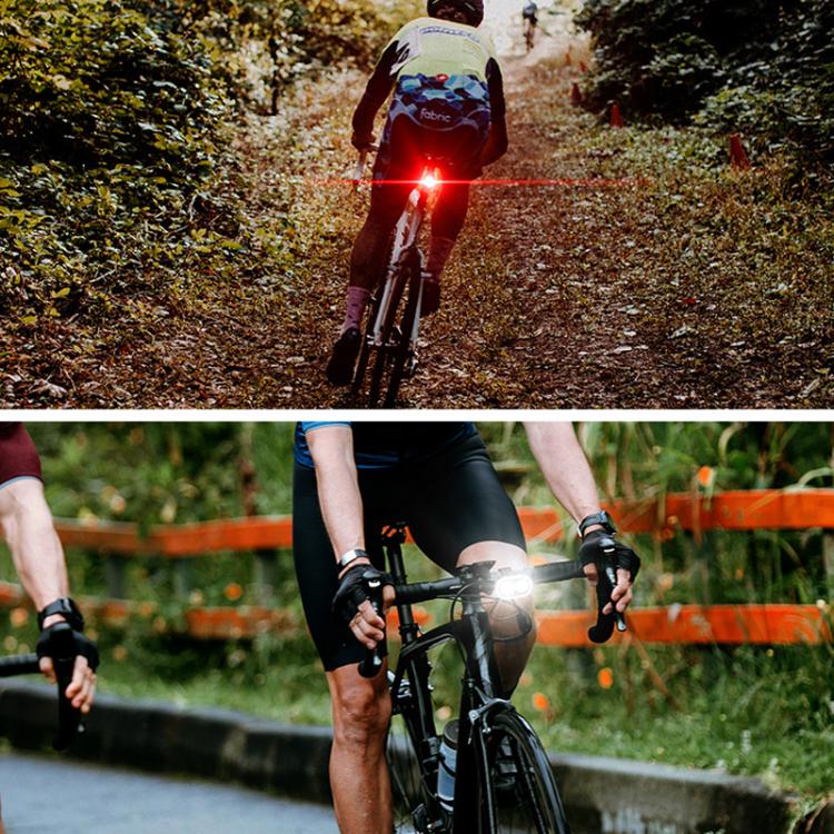 Bicycle with front white headlight and rear red taillight lit while riding