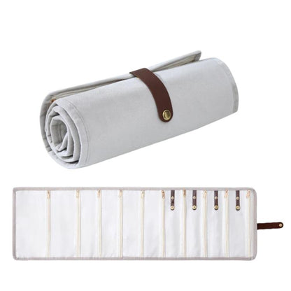 Beige gray roll-up velvet jewelry organizer bag with snap strap and lined compartments
