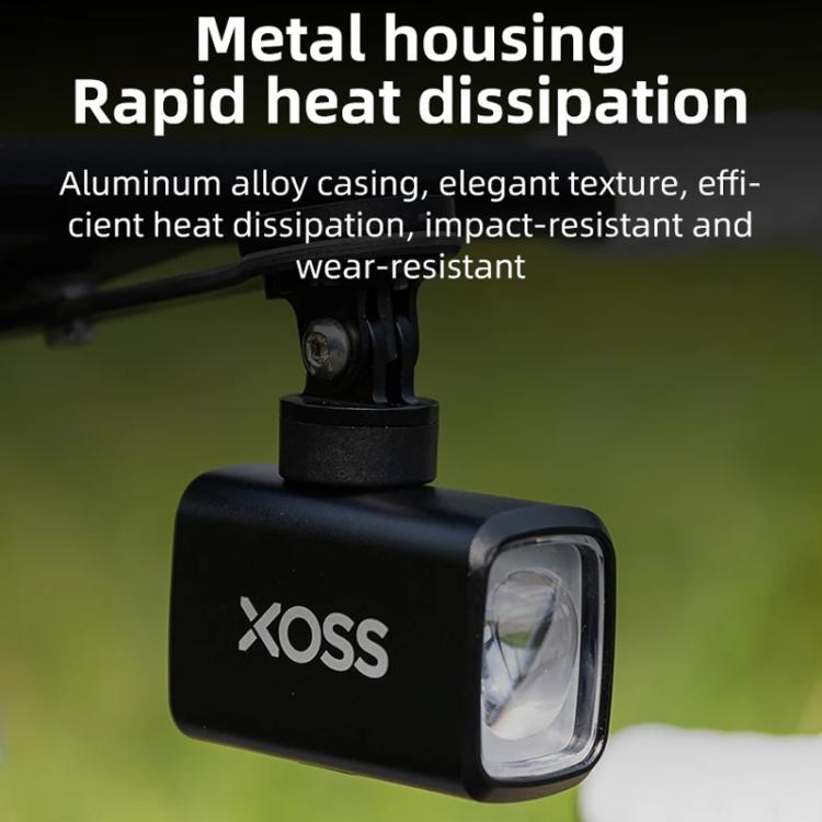 XOSS Mini bike headlight with black housing and front lens detail