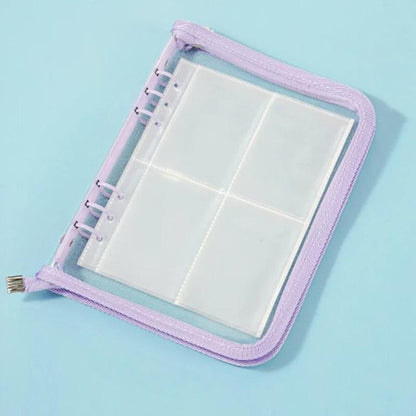 Purple clear PVC zipper pouch with four-pocket inner pages and binder rings