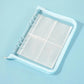 Light blue clear PVC zipper pouch with four-pocket inner pages and binder rings