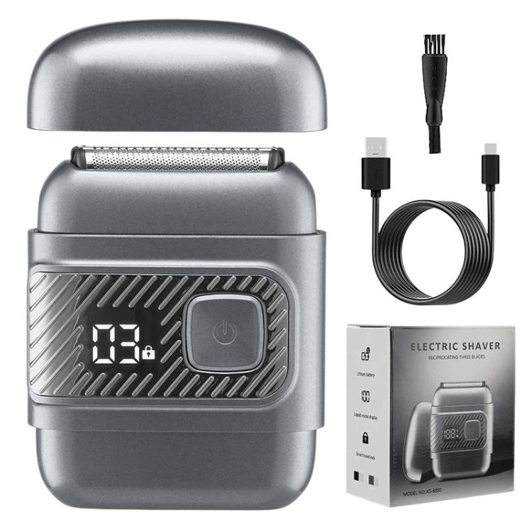 Silver reciprocating electric shaver with LCD screen and charging cable set