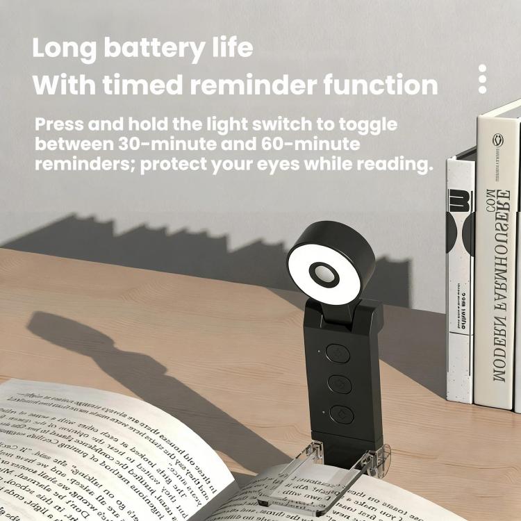Mini USB clip-on LED bookmark lamp with round ring head, black body and clip base.