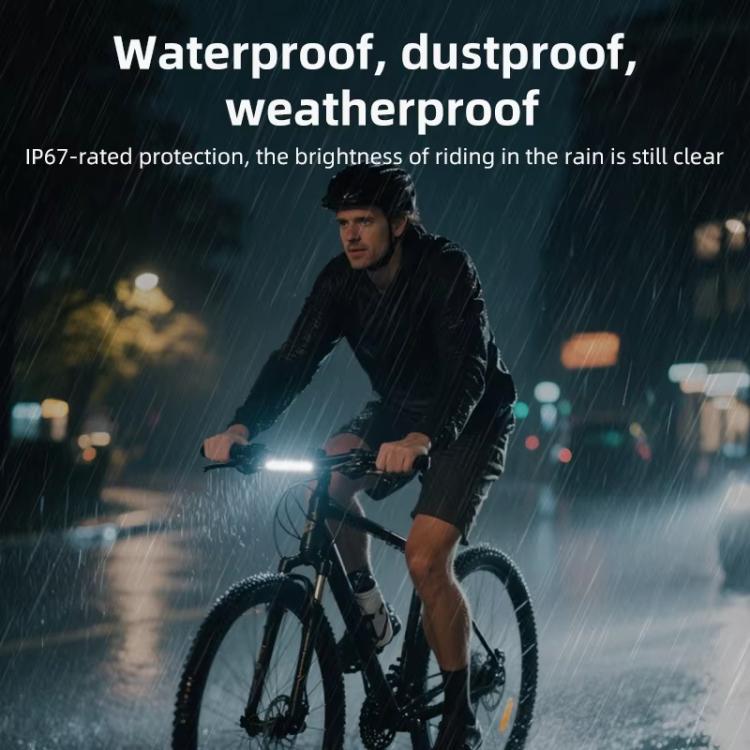 Cyclist using a rechargeable front bike light emitting a white beam on the bike