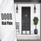 Installed metal door kick plate protector on a dark entry door, brushed silver