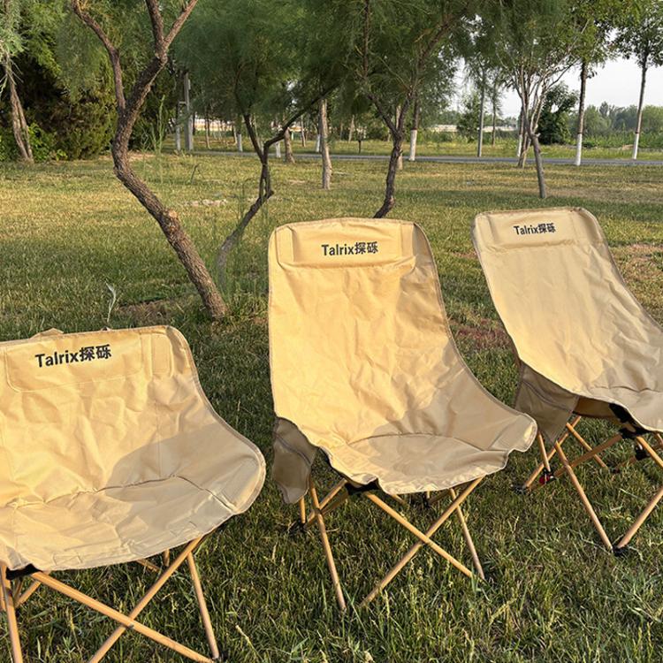 Portable folding moon chairs with light beige protective covers and bronze legs