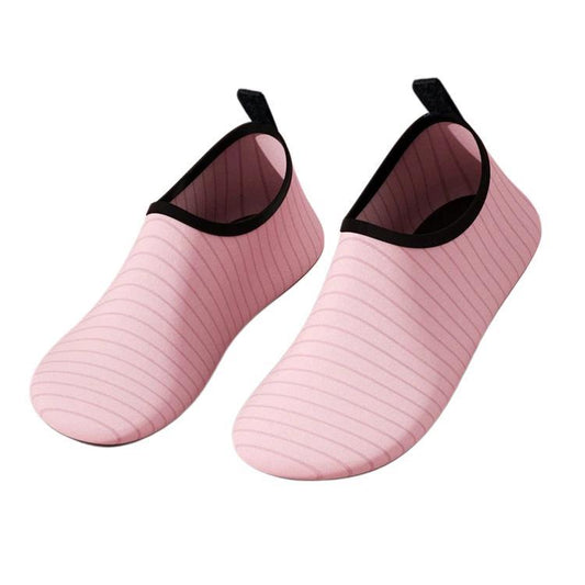 Pink striped slip-on indoor shoes with black collar and soft rubber sole