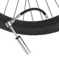 Black bicycle pump extension hose connected to a tire with metal nozzle adapters