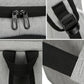 Insulated backpack cooler, gray fabric with black straps and side carry handle loops