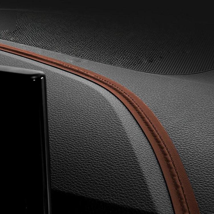 Car interior gap leather trim strip in brown leather with stitching