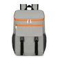 Vanaheimr insulated hiking backpack in gray with orange zipper accents and front zip pocket.