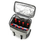 Vanaheimr insulated hiking backpack with open foil-lined interior and bottles stored inside.