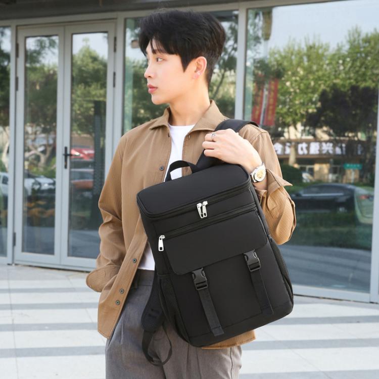 Vanaheimr insulated hiking backpack in black, worn on the shoulder.