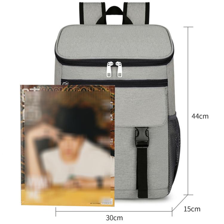 Gray insulated hiking backpack with front zip pocket, side mesh, and padded straps