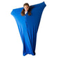 Blue children’s sensory body sock with long draped wing shape, child wearing