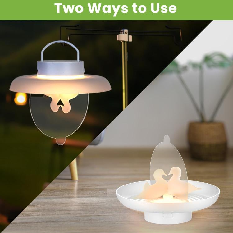 White indoor outdoor insect trap with warm light glowing from the center