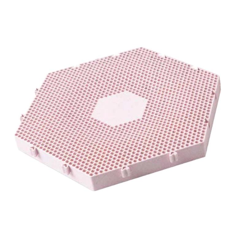 Pink hexagon cat scratcher mat with honeycomb surface and round center cutout