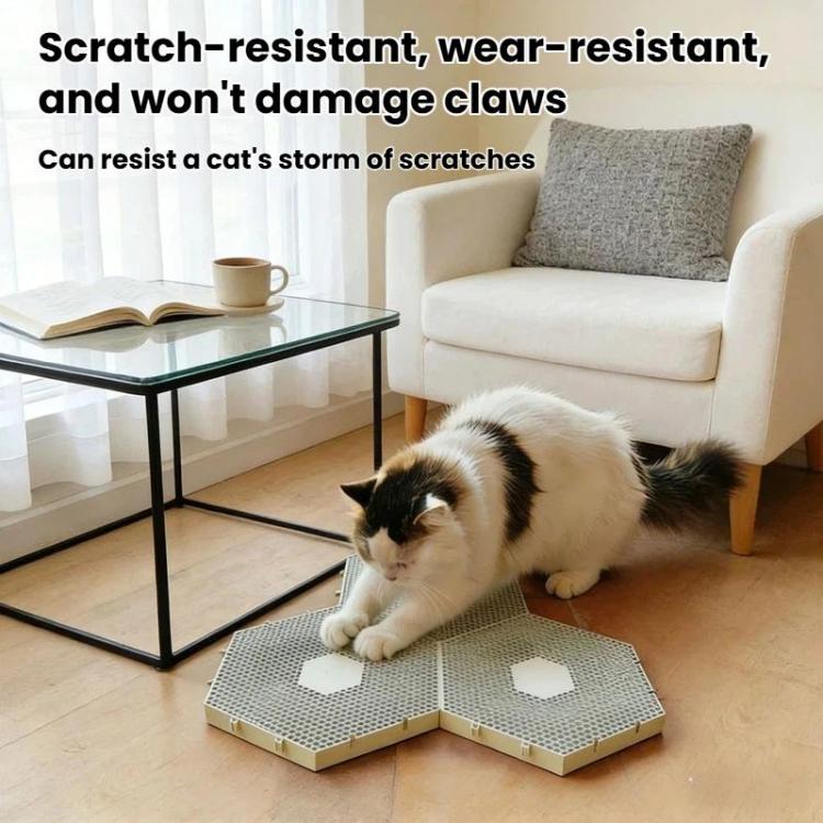 Light tan hexagonal cat scratcher mat with honeycomb surface and round center cutout