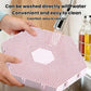 Pink hexagonal cat scratcher mat being rinsed, honeycomb surface with round center cutout