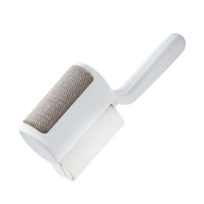 Household lint roller brush with white handle and soft gray bristles roller