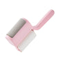 Household lint roller brush with pink handle and soft gray bristles roller