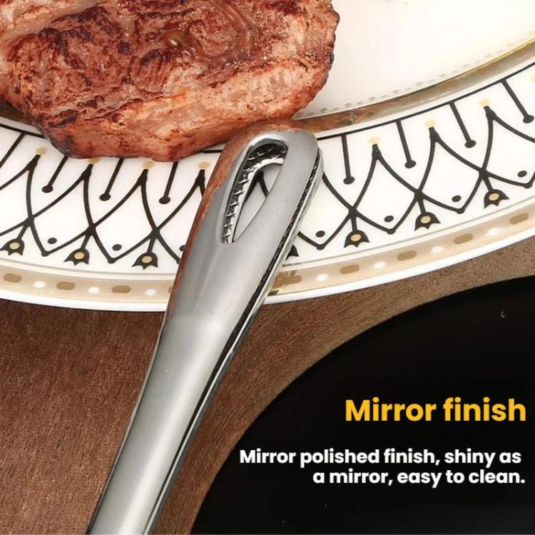 Stainless steel mirror-finish tongs with perforated grip tip, close-up