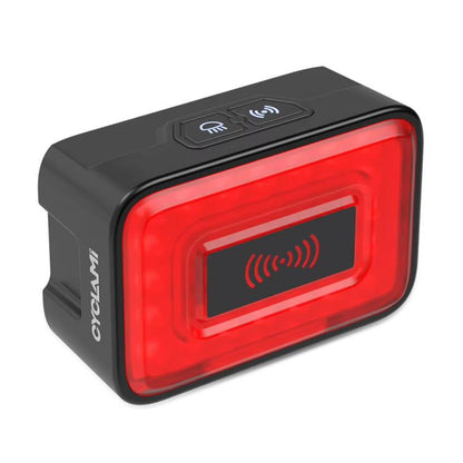 Bicycle radar tail light with red LED window and black housing, top button controls