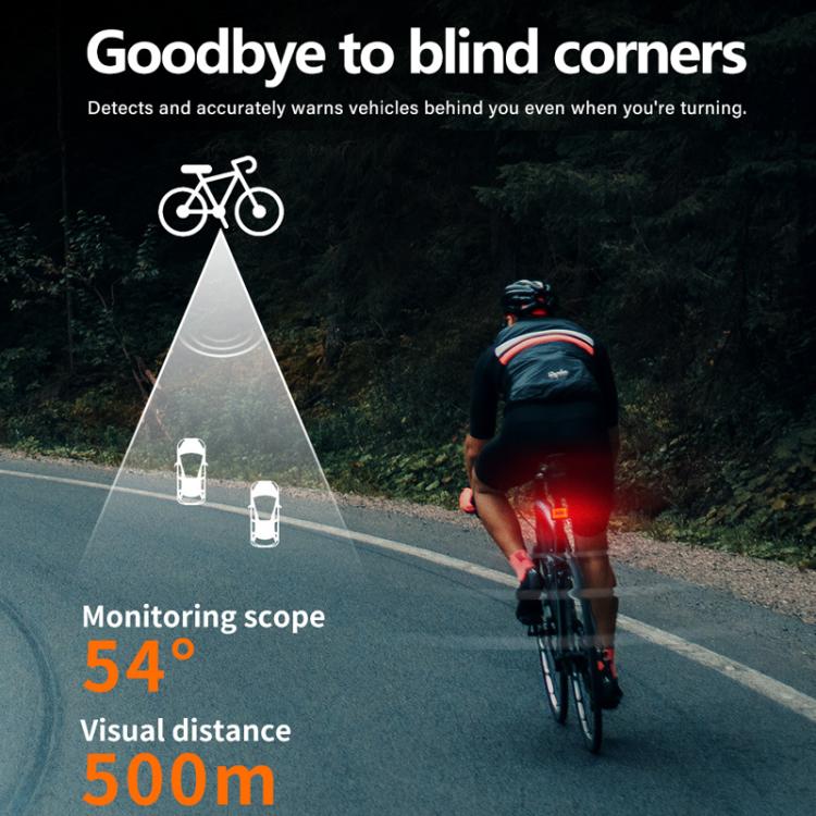 Bicycle radar tail light mounted at rear, showing bright red glow