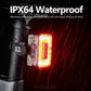 Waterproof bicycle radar tail light close-up with glowing red LED window and raindrops