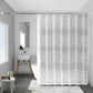 White shower curtain with light-gray damask floral pattern, ring-top hanging