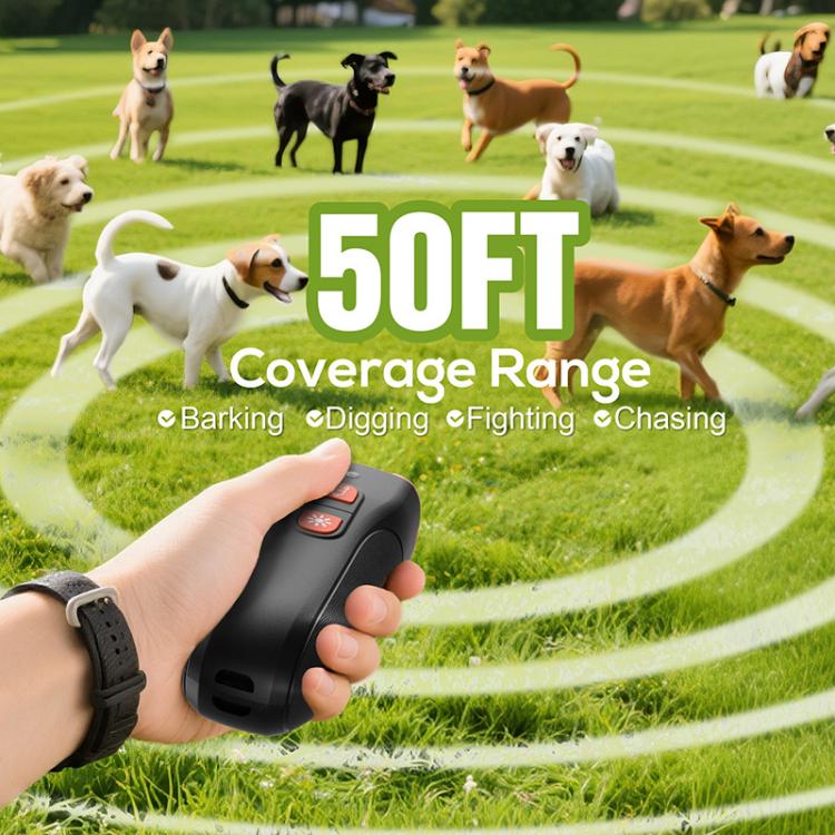 Handheld ultrasonic dog repeller in hand, black body with orange emitter openings