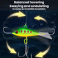 Balanced ice fishing lure, green-yellow with red eye, treble hooks and central ring
