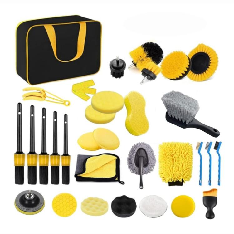 Car wash cleaning kit set with yellow brushes and sponges, plus storage bag