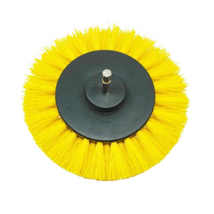 Round car wash scrub brush head with yellow bristles and center mount