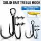 Black treble bait hooks with sharp points and bait-holder spikes, set of two