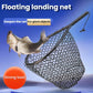 Floating landing net with black hexagonal mesh bag and long grip handle