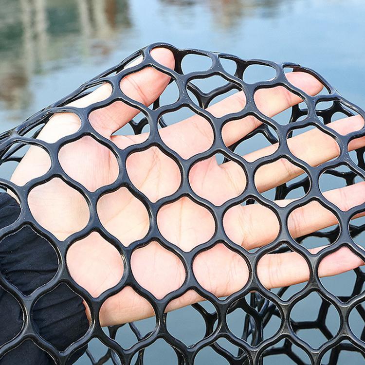 Close-up of black hexagonal mesh netting with elastic net structure